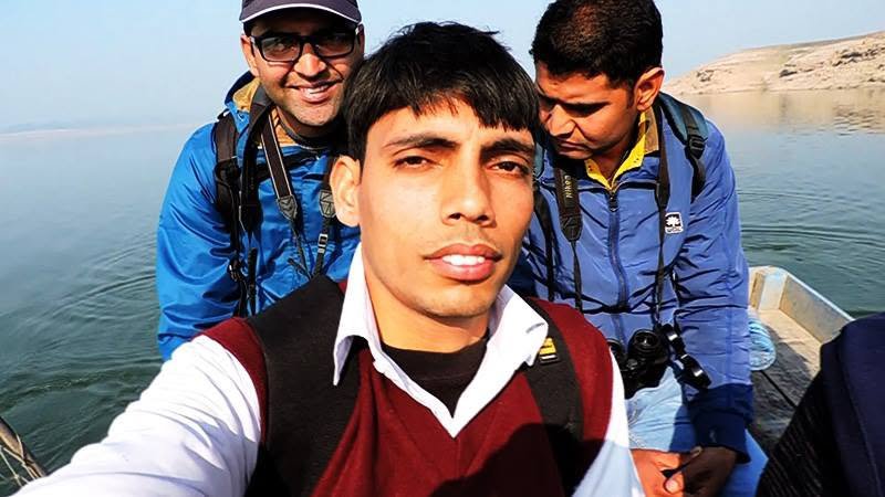 Census team rawboat survey on Pong Dam
